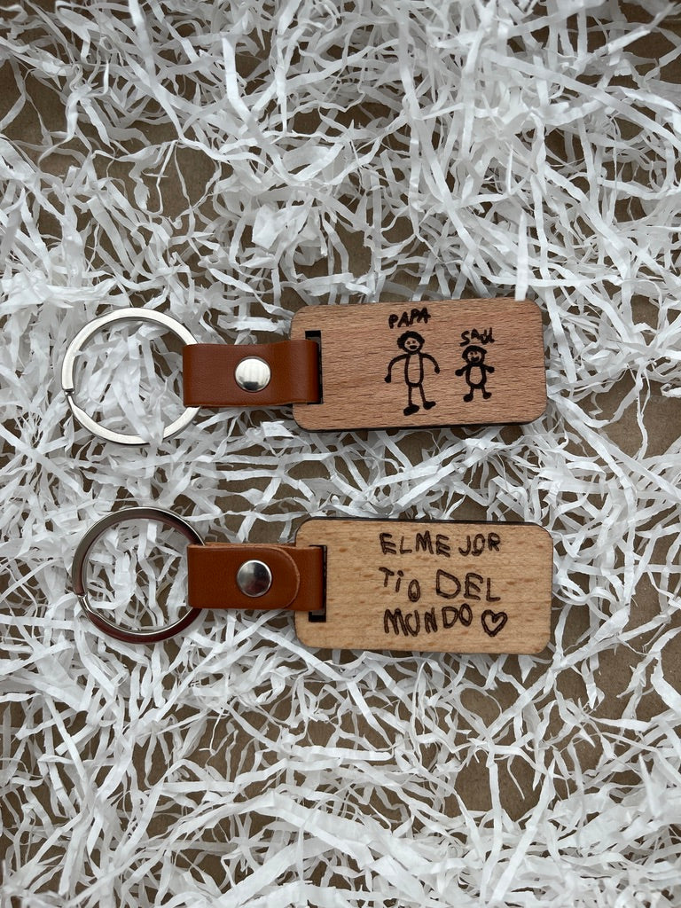 Llavero grabado con letra de niños