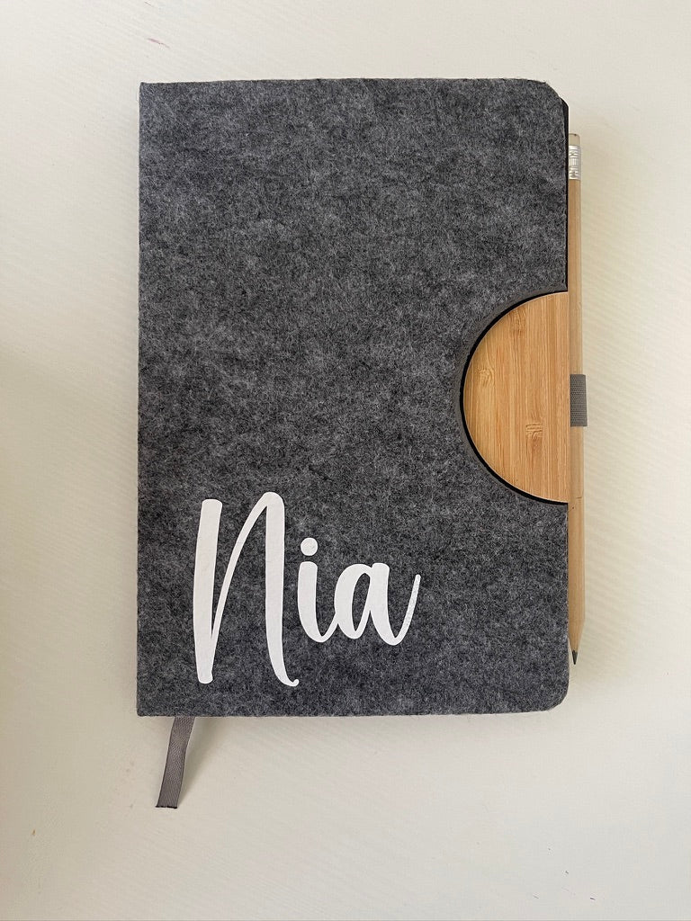 Libreta y lapicero
