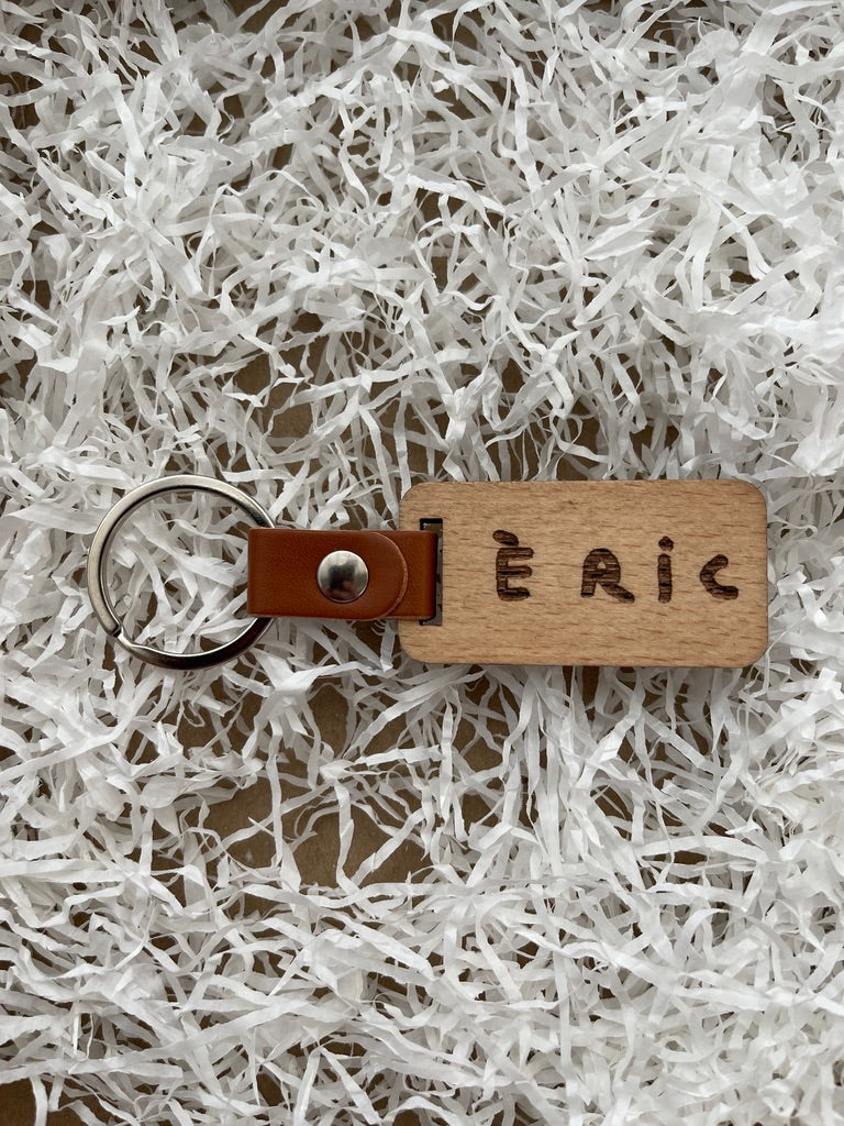 Llavero grabado con letra de niños