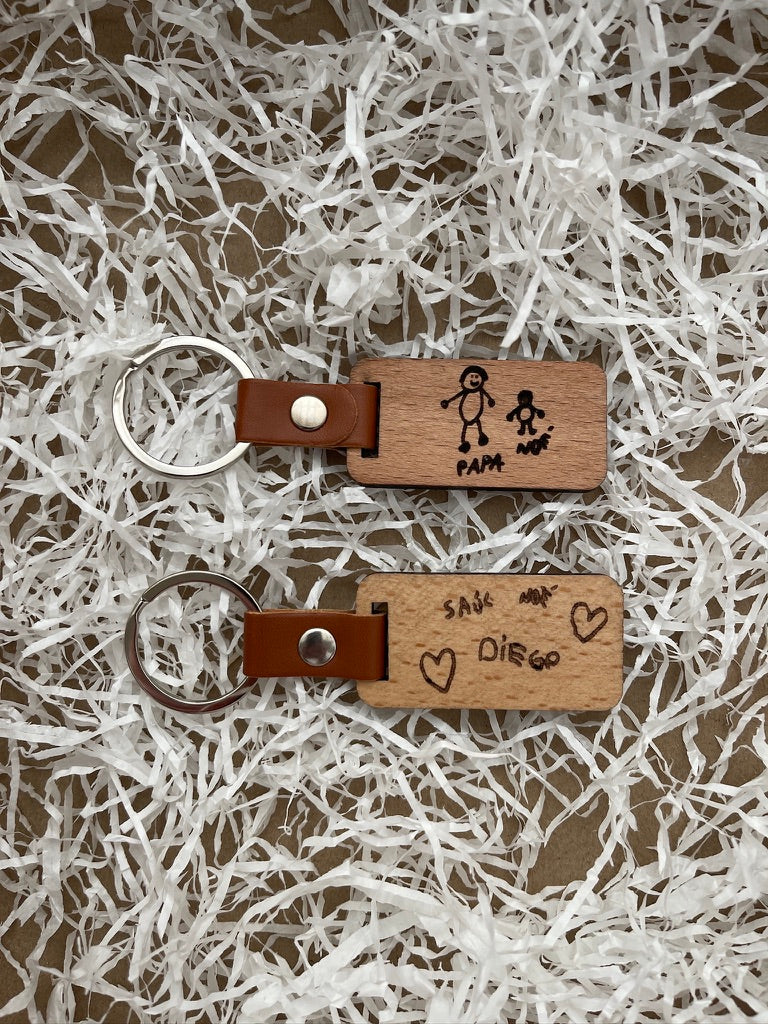 Llavero grabado con letra de niños