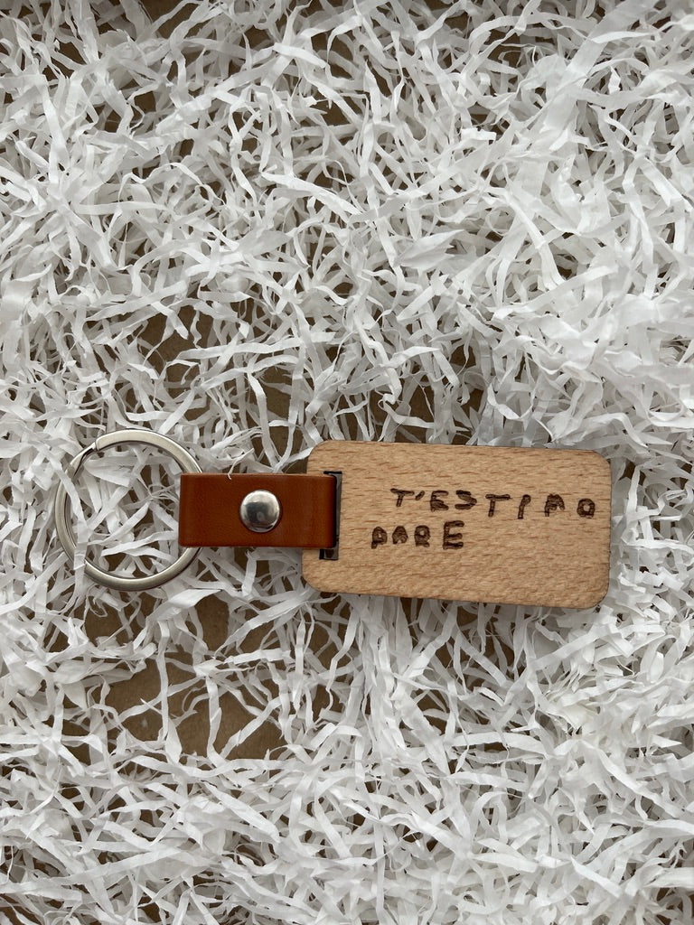 Llavero grabado con letra de niños