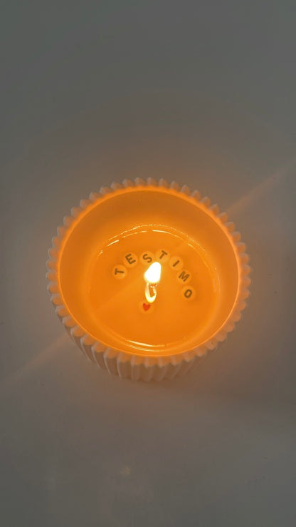 Vela con mensaje secreto