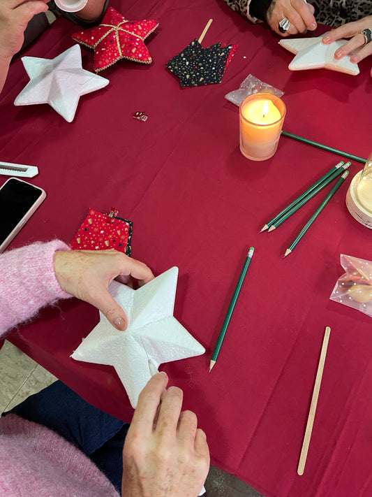 Taller estrella de Navidad con tela